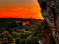 Blick vom Großvatterfelsen auf das Schloss Blankenburg im Sonnenuntergang